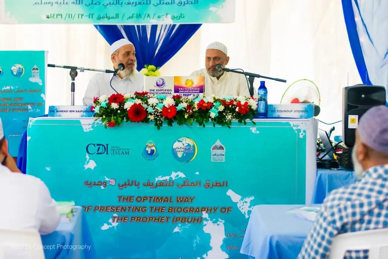 Speakers delivering a talk in front of an audience